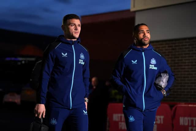 Newcastle United's Callum Wilson, right, arrives at the City Ground with team-mate Kieran Trippier.