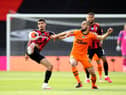 Nabil Bentaleb of Newcastle United and Philip Billing of Bournemouth battle for possession  during the Premier League match between AFC Bournemouth and Newcastle United at Vitality Stadium on July 01, 2020 in Bournemouth, England.