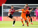 Nabil Bentaleb of Newcastle United and Philip Billing of Bournemouth battle for possession  during the Premier League match between AFC Bournemouth and Newcastle United at Vitality Stadium on July 01, 2020 in Bournemouth, England.