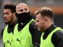 Newcastle United's English midfielder Jonjo Shelvey (C) looks on during the warm up ahead of the English Premier League football match between Newcastle United and Aston Villa at St James' Park in Newcastle-upon-Tyne, north east England on March 12, 2021.