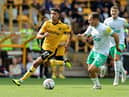 Matheus Luiz Nunes of Wolverhampton Wanderers gets away from Ryan Fraser during the Premier League match between Wolverhampton Wanderers and Newcastle United at Molineux on August 28, 2022 in Wolverhampton, England. (Photo by David Rogers/Getty Images)