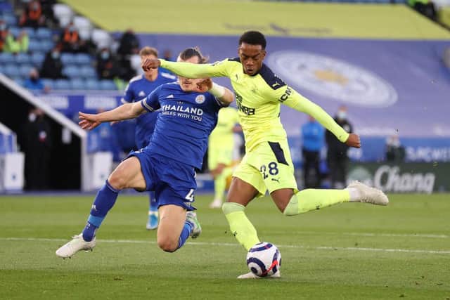 Newcastle United's English midfielder Joe Willock (R) shoots and scores their first goal during the English Premier League football match between Leicester City and Newcastle United at King Power Stadium in Leicester, central England on May 7, 2021.