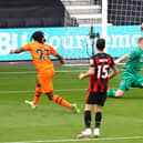 BOURNEMOUTH, ENGLAND - JULY 01: Valentino Lazaro of Newcastle United scores his team's fourth goal during the Premier League match between AFC Bournemouth and Newcastle United at Vitality Stadium on July 01, 2020 in Bournemouth, England.