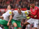 Manchester United's Raphael Varane of Newcastle United's Dan Burn.