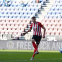 Charlie Wyke scores against Wigan earlier this year