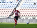 Charlie Wyke scores against Wigan earlier this year