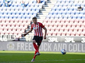 Charlie Wyke scores against Wigan earlier this year