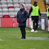 Lee Johnson watches on at Sincil Bank