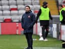 Lee Johnson watches on at Sincil Bank