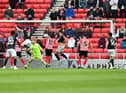 Tom Hopper scores the crucial goal for Lincoln City