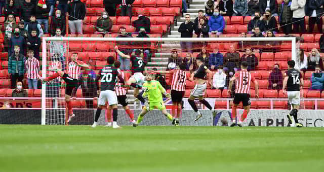 Tom Hopper scores the crucial goal for Lincoln City
