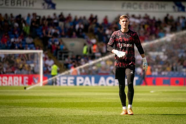 Dean Henderson of Manchester United warms up prior to the Premier League match between Crystal Palace and Manchester United at Selhurst Park on May 22, 2022 in London, United Kingdom. (Photo by Ash Donelon/Manchester United via Getty Images)