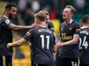 Newcastle United's Jamaal Lascelles, Matt Ritchie, Emil Krafth and Sean Longstaff celebrate Newcastle United's win over Norwich City.