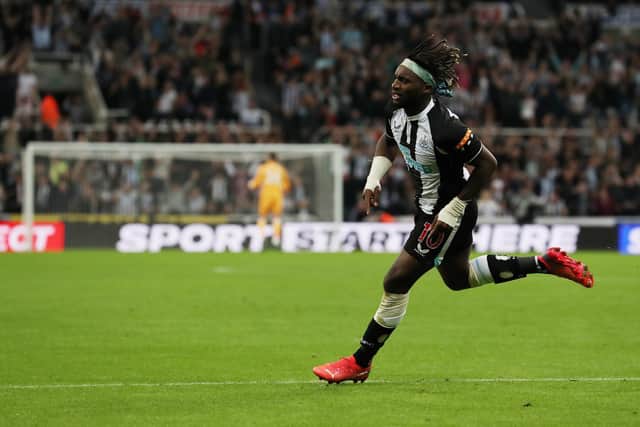 NEWCASTLE UPON TYNE, ENGLAND - SEPTEMBER 17: Allan Saint-Maximin of Newcastle United celebrates after scoring their team's first goal during the Premier League match between Newcastle United and Leeds United at St. James Park on September 17, 2021 in Newcastle upon Tyne, England. (Photo by Ian MacNicol/Getty Images)