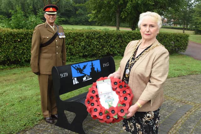 South Tyneside Deputy Mayor, Gladys Hobson and Major Andy Loader 101 Regiment Royal Artillery, laid a wreath and unveiled a memorial bench at Carr Ellison war memorial in Hebburn to mark VJ Day.
