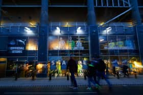 Fans make their way past the official store ahead of the Barclays Premier League match between Newcastle United and Everton at St James' Park on March 25, 2014 in Newcastle upon Tyne, England.