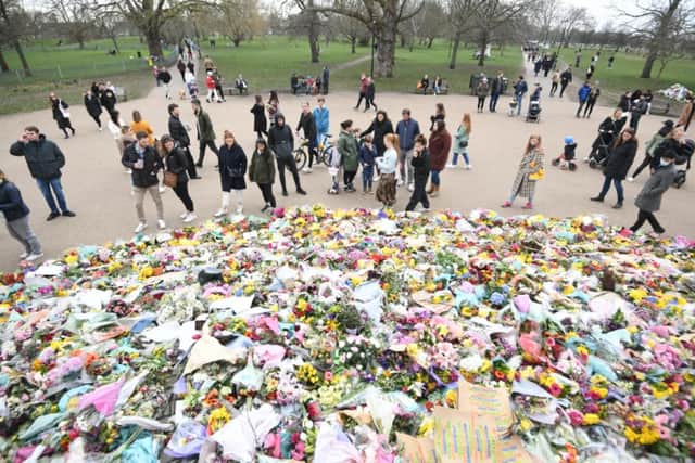 Floral tributes left at the bandstand in Clapham Common, London, for Sarah Everard.