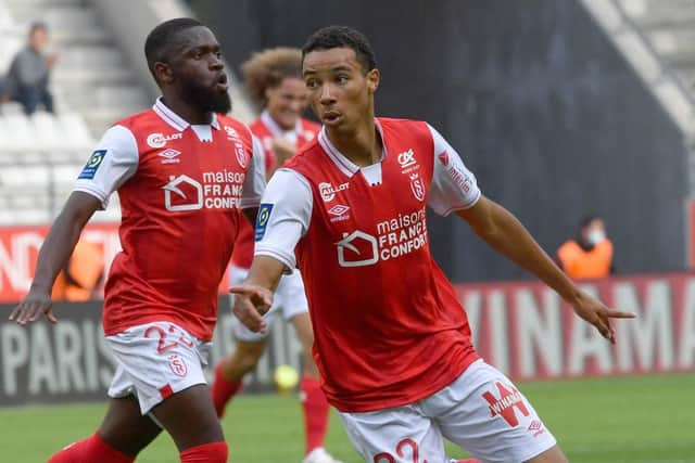 Reims's forward Hugo Ekitike celebrates after scoring a goal during the French L1 football match between Stade de Reims and FC Nantes at Stade Auguste Delaune in Reims, northern France on September 26, 2021. (Photo by DENIS CHARLET / AFP) (Photo by DENIS CHARLET/AFP via Getty Images)