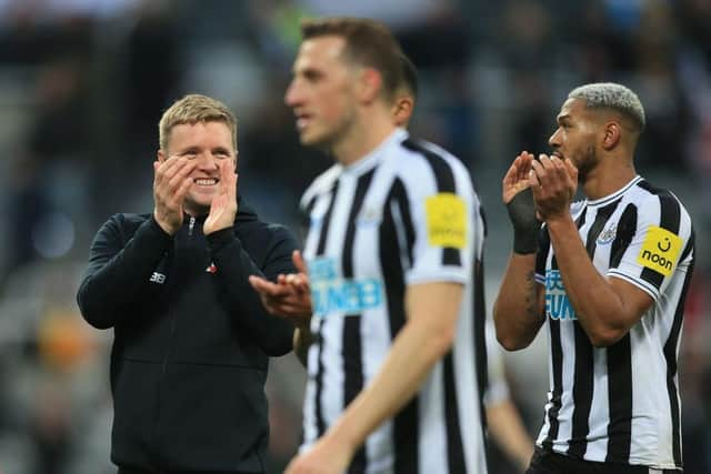 Newcastle United head coach Eddie Howe applauds fans at the final whistle.