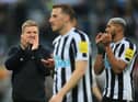 Newcastle United head coach Eddie Howe applauds fans at the final whistle.