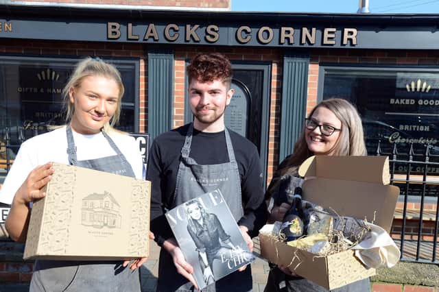 Blacks Corner Deli staff from left Elle Ramshaw, Nathan Bell and Lauren Gracie with the hampers that feature in Vogue magazine