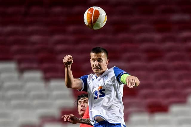 Lubomir Satka playing for Lech Poznan against Benfica.