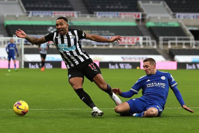 Newcastle United's Callum Wilson reacts to a challenge from Leicester City's Timothy Castagne.