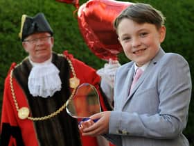 #LoveSouthTyneside winner 9-year-old Oliver Nicholson receives his award from the Mayor Cllr Norman Dick and Mayoress Mrs Jean Williamson.