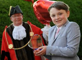 #LoveSouthTyneside winner 9-year-old Oliver Nicholson receives his award from the Mayor Cllr Norman Dick and Mayoress Mrs Jean Williamson.