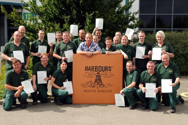 Robson Green, centre, joined Barbour employees who were receiving NVQ level 2 awards in 2013. Recognise anyone?