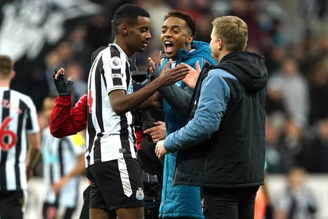 Newcastle United's Alexander Isak celebrates with head coach Eddie Howe and Joe Willock following this month's win over Fulham.
