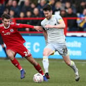 ACCRINGTON, ENGLAND - JANUARY 26:  David Nugent of Derby County runs with the ball under pressure from Dan Barlaser of Accrington Stanley during the FA Cup Fourth Round match between Accrington Stanley and Derby County at Wham Stadium on January 26, 2019 in Accrington, United Kingdom.  (Photo by Jan Kruger/Getty Images)