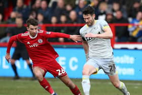 ACCRINGTON, ENGLAND - JANUARY 26:  David Nugent of Derby County runs with the ball under pressure from Dan Barlaser of Accrington Stanley during the FA Cup Fourth Round match between Accrington Stanley and Derby County at Wham Stadium on January 26, 2019 in Accrington, United Kingdom.  (Photo by Jan Kruger/Getty Images)