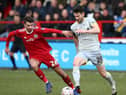 ACCRINGTON, ENGLAND - JANUARY 26:  David Nugent of Derby County runs with the ball under pressure from Dan Barlaser of Accrington Stanley during the FA Cup Fourth Round match between Accrington Stanley and Derby County at Wham Stadium on January 26, 2019 in Accrington, United Kingdom.  (Photo by Jan Kruger/Getty Images)