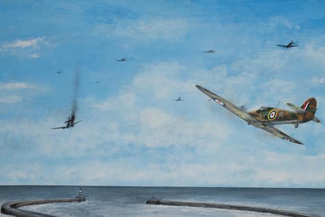 Squadron Leader Fl Lt Archie McKeller DSO, DFC and Bar of No. 605 Squadron from Drem in Scotland shooting down a German Heinkel 111 bomber beyond Seaham Harbour.