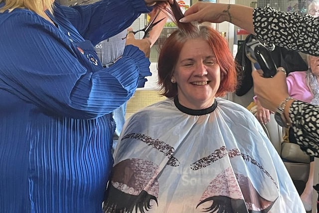 Sarah Parkin, Home Administrator at HC-One’s Stoneleigh Care Home in the process of having her hair shaved off