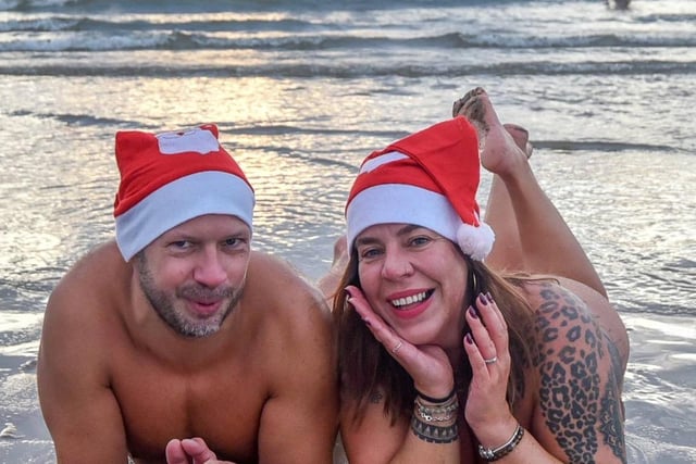 Peter Major and Linda Snobkova, from Slovakia, donned Christmas hats to take the plunge.