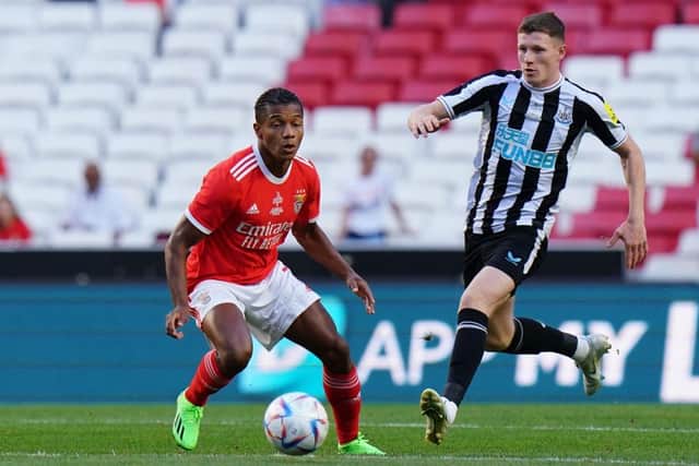 David Neres of SL Benfica with Elliot Anderson of Newcastle United FC in action during the Eusebio Cup match between SL Benfica and Newcastle United at Estadio da Luz on July 26, 2022 in Lisbon, Portugal.  (Photo by Gualter Fatia/Getty Images)