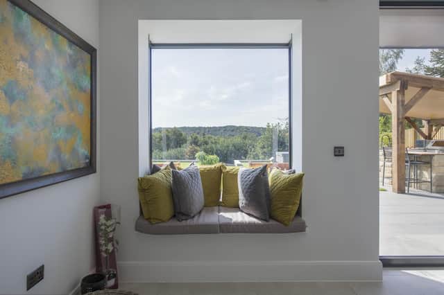 Create a cosy nook with cushions and pillows (photo: Express Bi-Folding Doors)