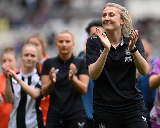 Newcastle United Women manager Becky Langley applauds fans last season.