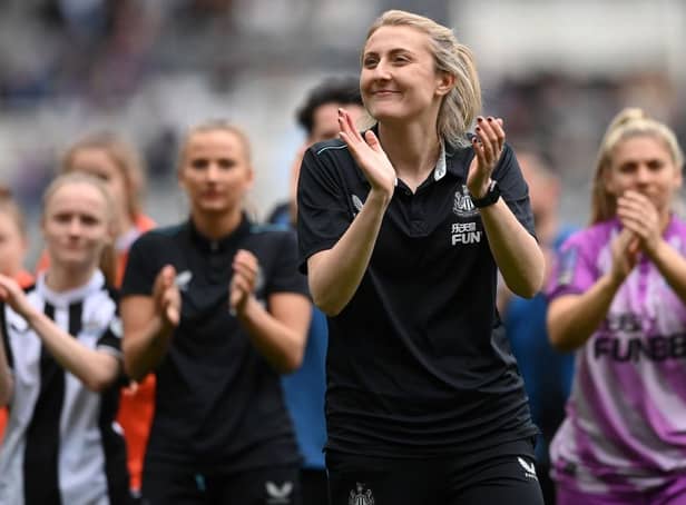 Newcastle United Women manager Becky Langley applauds fans last season.