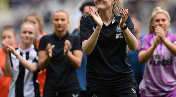 Newcastle United Women manager Becky Langley applauds fans last season.