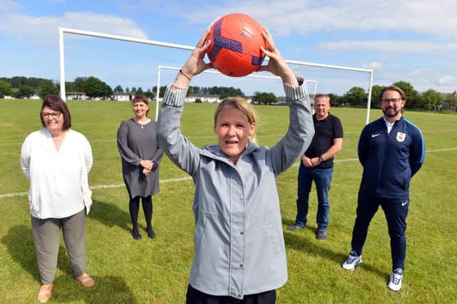 Hedworthfield CA receive football pitches improvement grant. From left manager Christine Green, chair Cllr Geraldine Kilgour, manager Jill Charlton, director Kev Brydon and FA Football Foundation Chris Hutchinson.