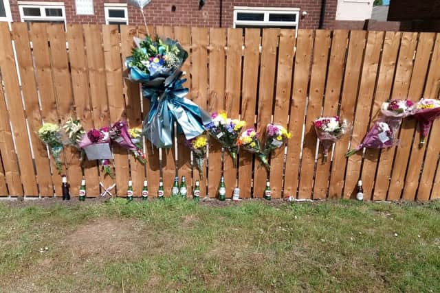 Flowers left in tribute to Brandon Lee, 24.