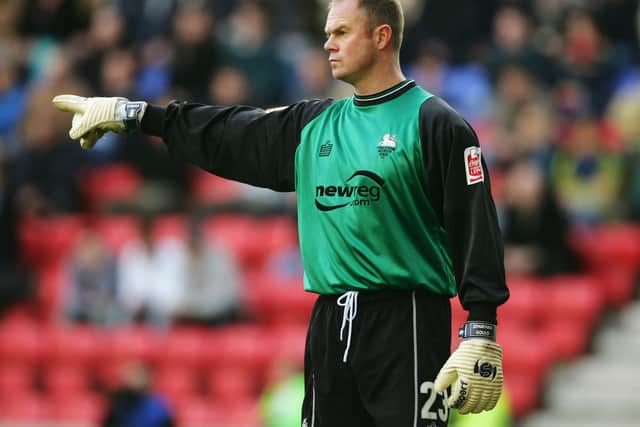 WIGAN, ENGLAND - DECEMBER 5:  Jonathan Gould of Preston North End in action during the Coca Cola Championship match between Wigan Athletic and Preston North End at the JJB Stadium on December 5, 2004 in Wigan, England.  (Photo by Alex Livesey/Getty Images)