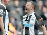 Ryan Fraser of Newcastle United celebrates scoring the opening goal during the Premier League match between Newcastle United and Brighton & Hove Albion at St. James Park on March 05, 2022 in Newcastle upon Tyne, England. (Photo by Ian MacNicol/Getty Images)