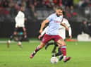 Morgan Sanson passes the ball during the pre-season friendly match between Manchester United and Aston Villa
