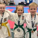 Medal winners Lucia Henderson, Charlotte Batey  and Leon Wilkinson.