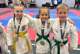 Medal winners Lucia Henderson, Charlotte Batey  and Leon Wilkinson.