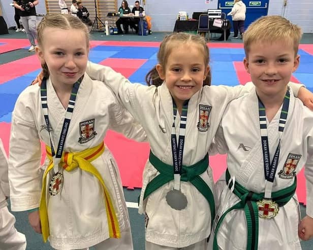 Medal winners Lucia Henderson, Charlotte Batey  and Leon Wilkinson.